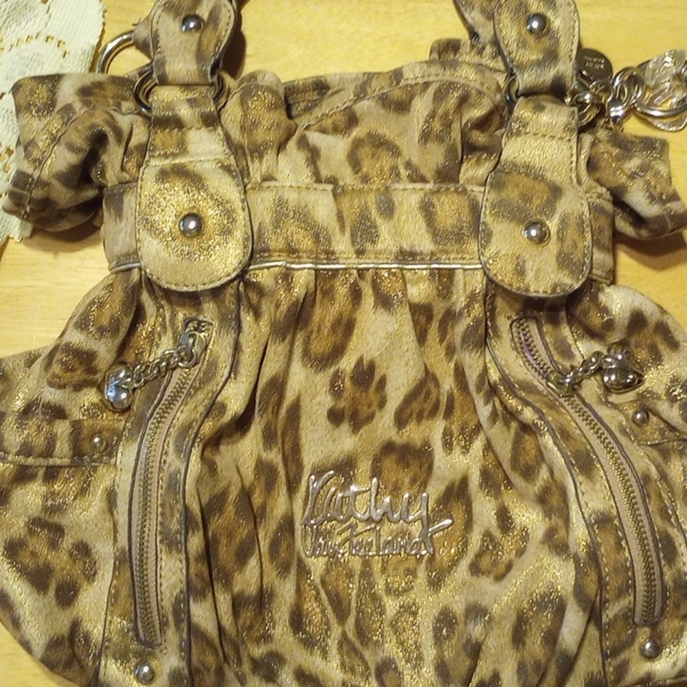 Kathy van Zeeland shiny gold leopard purse